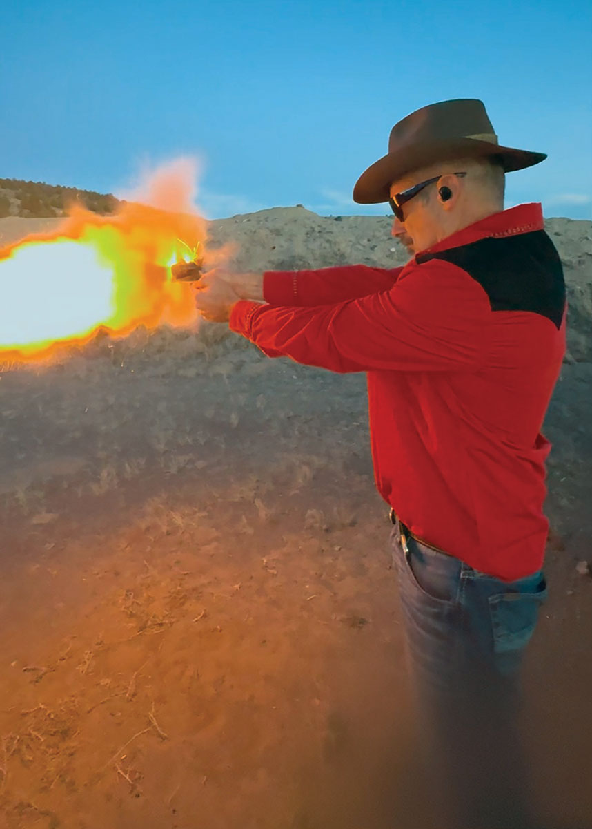 Side view of the revolver. A 25-grain load of FFFFg black powder firing a round ball. Note the flash ahead of the cylinder. A person wants to keep their hand out of that.